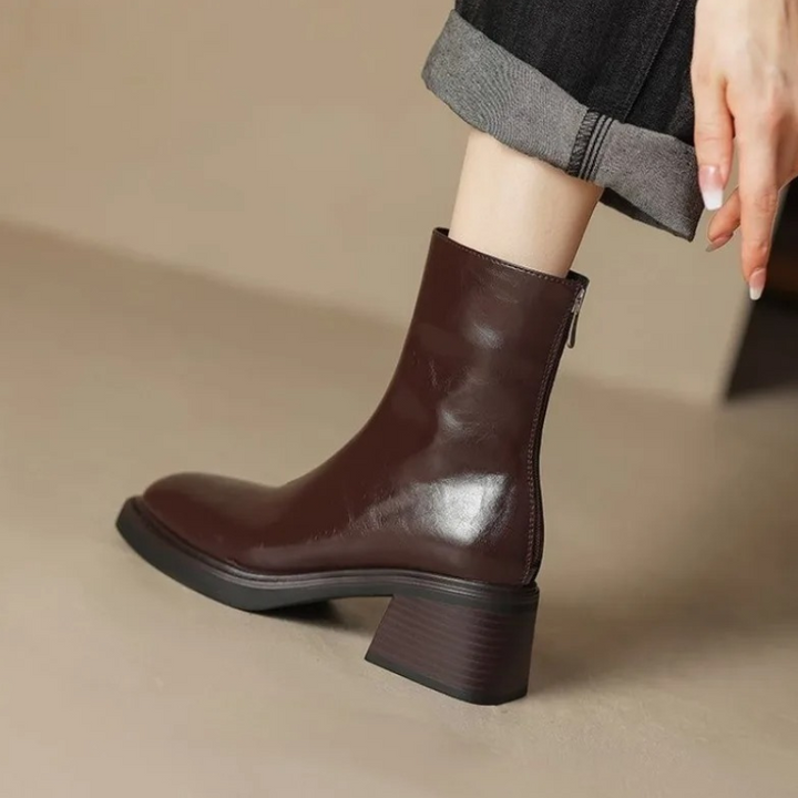 Brown Women’s Modern Square Toe Ankle Boots on the model