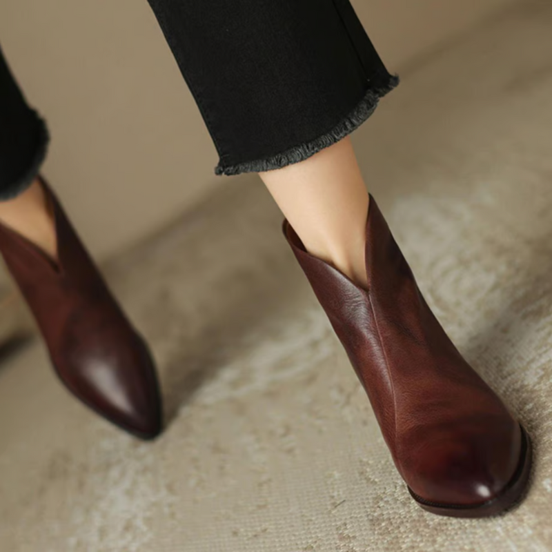 Brown Women’s Elegant Block Heel Ankle Boots on the model