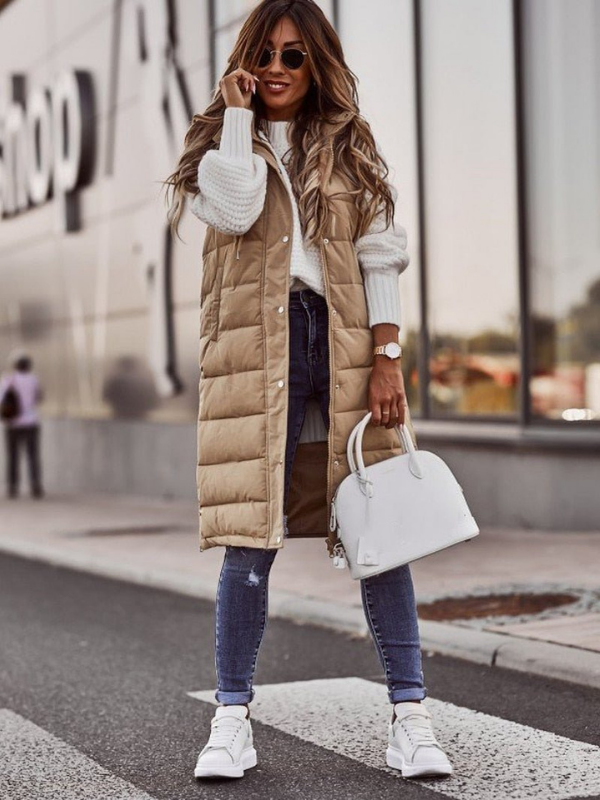 Beige Women’s Knee-Length Quilted Vest on the model