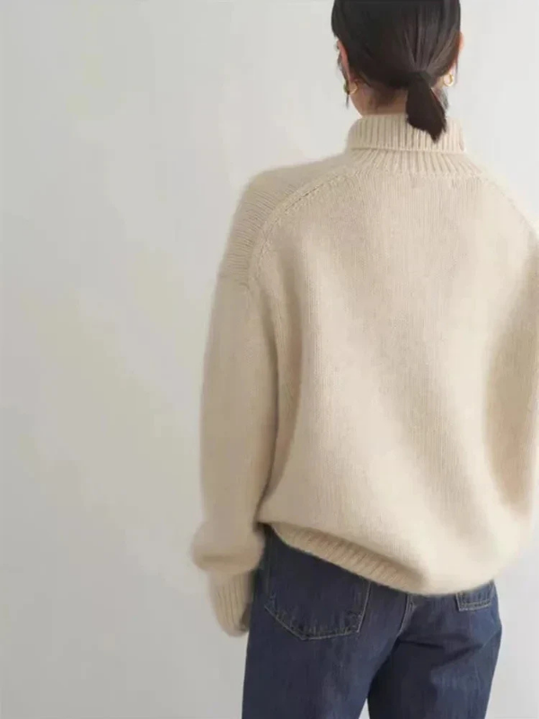 Apricot Women’s Soft Classic Fit Turtleneck Sweater on the model