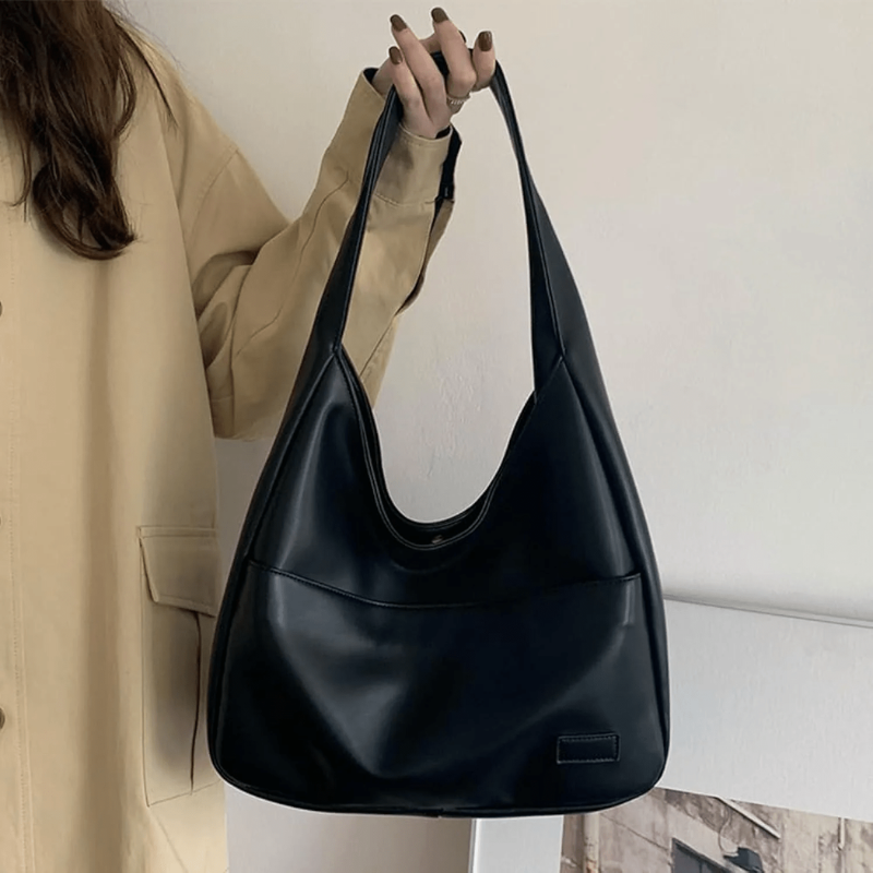 Women’s Black Spacious Leather Shoulder Bag on model