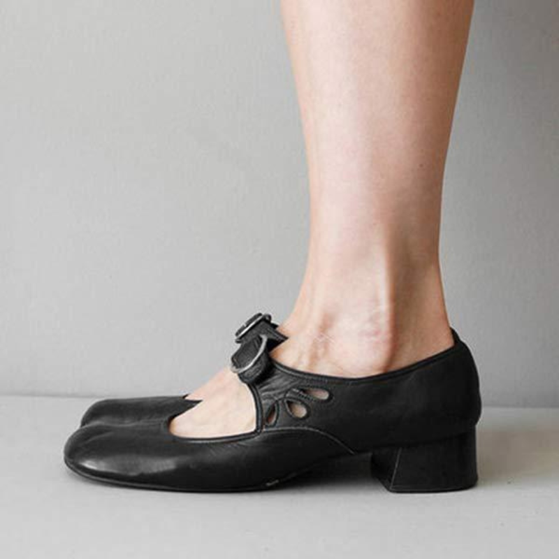 Black Women’s Wedge Buckle Detail Sandals on the model 