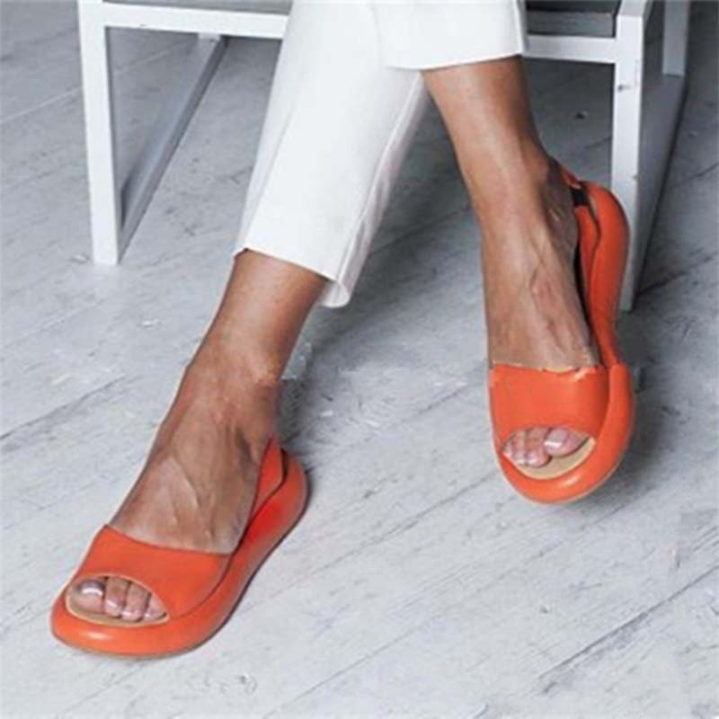 Orange Women’s Casual Footbed Slip-On Sandals on the model