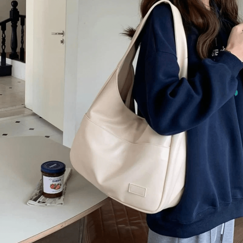 Women’s White Spacious Leather Shoulder Bag on model