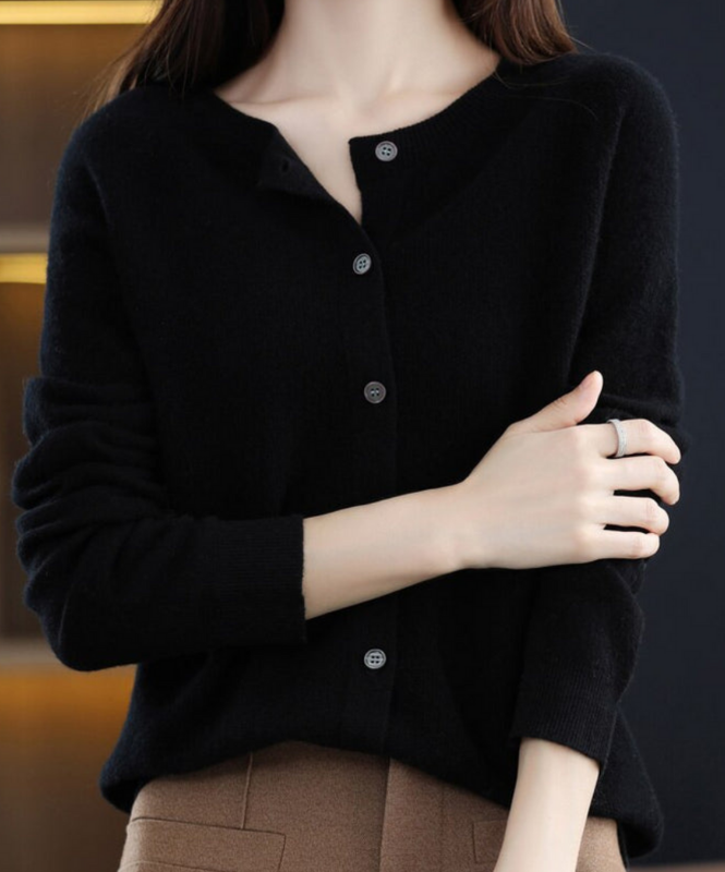 Black Women’s Elegant V-Neck Button-Detailed Sweater on the model