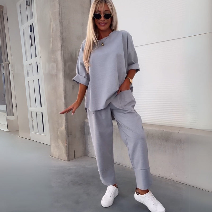 Gray Women’s Coordinated Minimalist Fit Tracksuit Set on the model