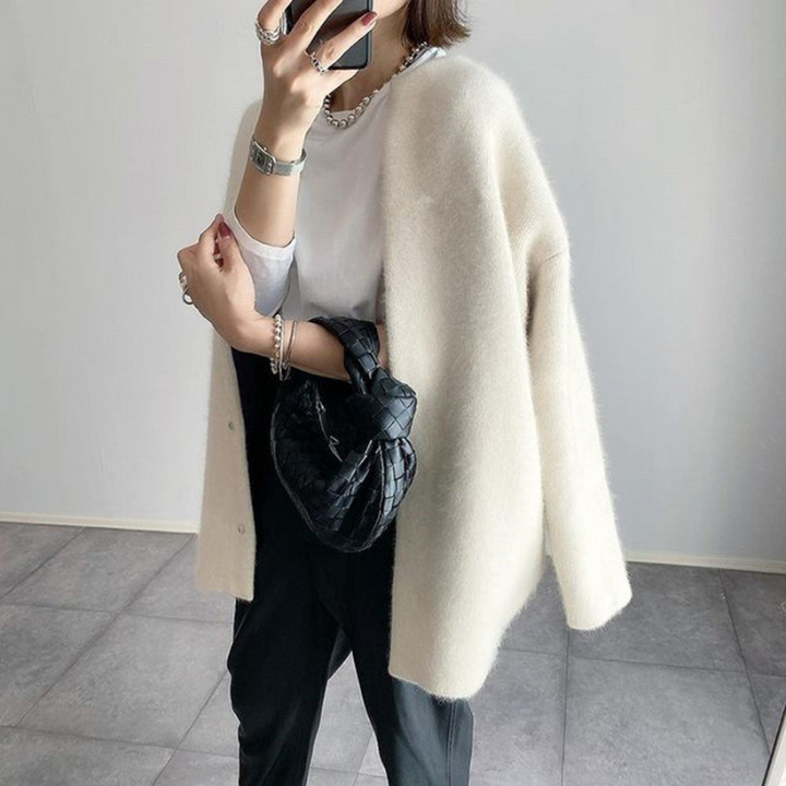 Cream Women’s Elegant Knit Cardigan Pocket Detail on model