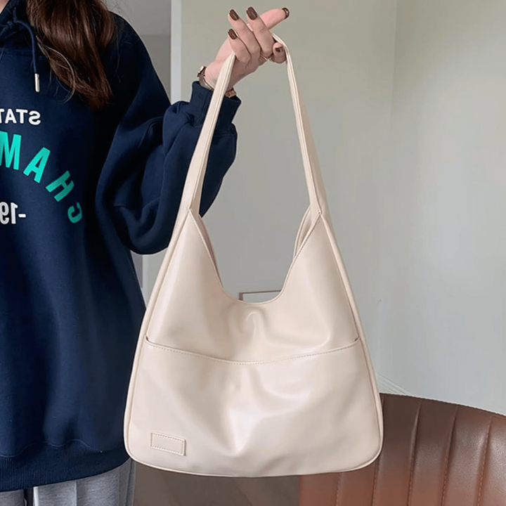 Women’s White Spacious Leather Shoulder Bag on model