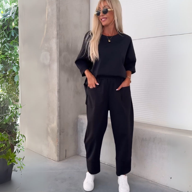 Black Women’s Coordinated Minimalist Fit Tracksuit Set on the model