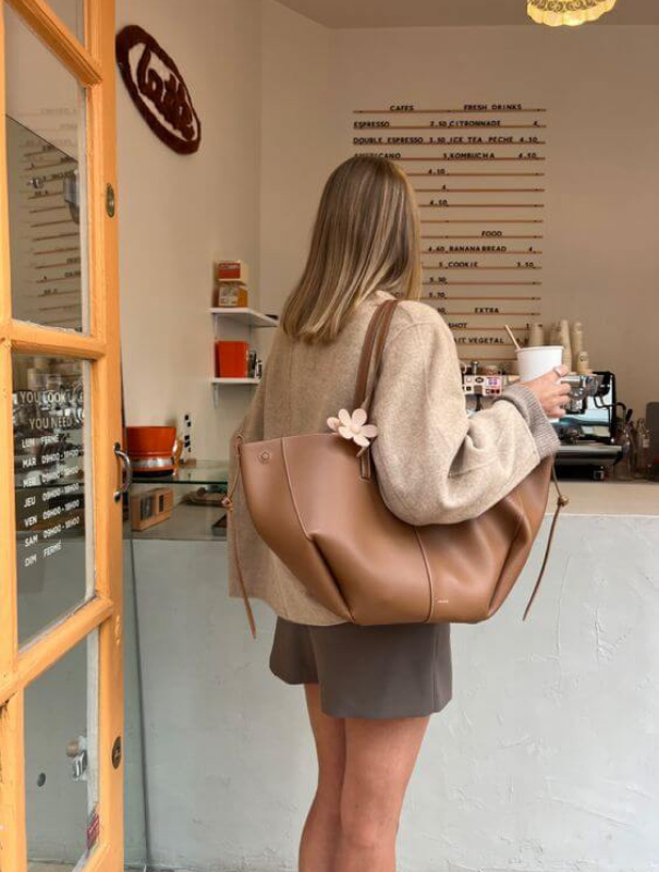 Brown Women’s Vintage Spacious Design Tote Bag on the model