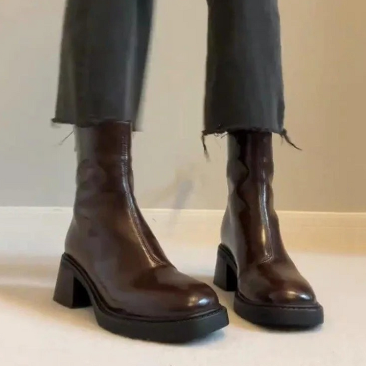 Brown Women’s Modern Square Toe Ankle Boots on the model