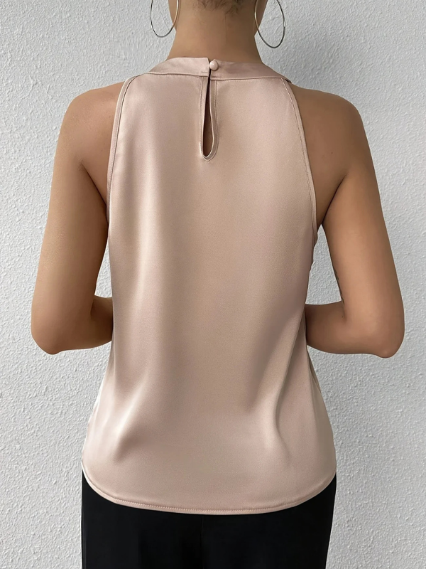 Beige Women’s Elegant Pleated Halter Neck Blouse on the model