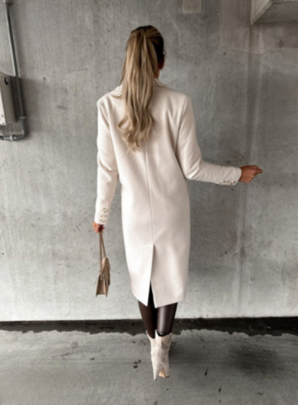 Beige Women’s Long Double-Breasted Tailored Fit Coat on the model