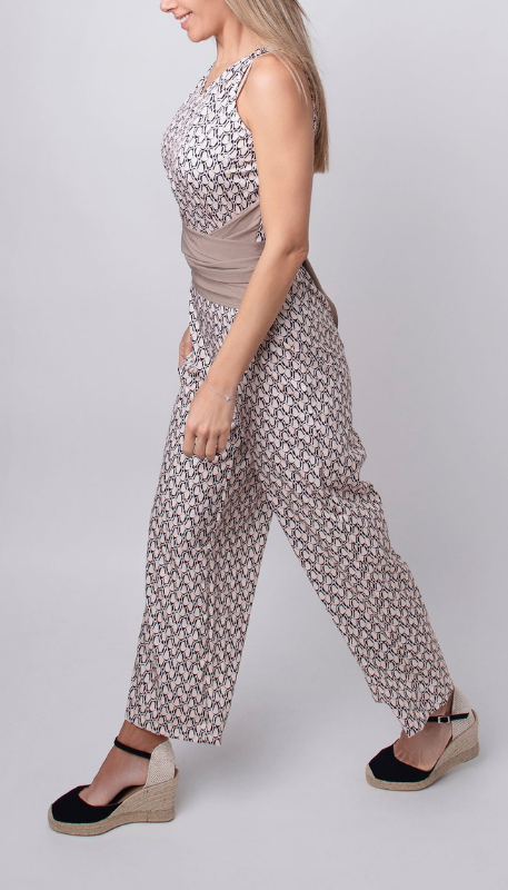 Beige Women’s Sleeveless Round Neck Fitted Jumpsuit on the model