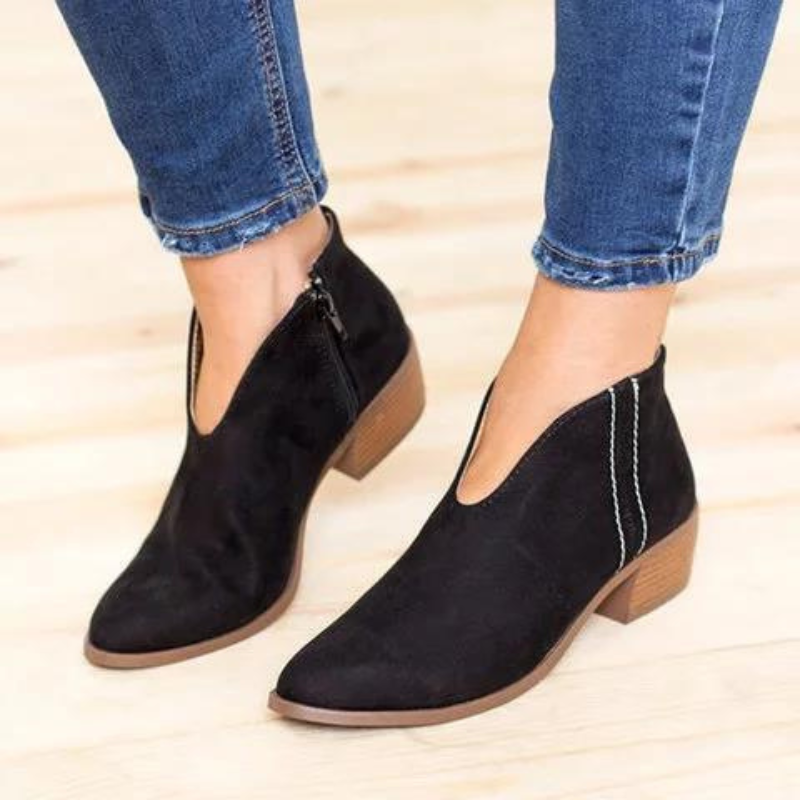 Black Women’s All-Season Chic Fit V-Cut Ankle Boots on the model