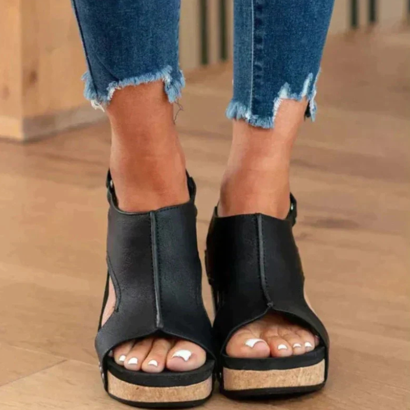 Black Women’s Comfort Wedge Heel Sandals on the model