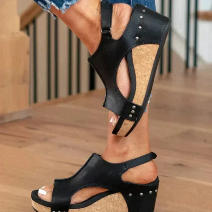 Black Women’s Comfort Wedge Heel Sandals on the model