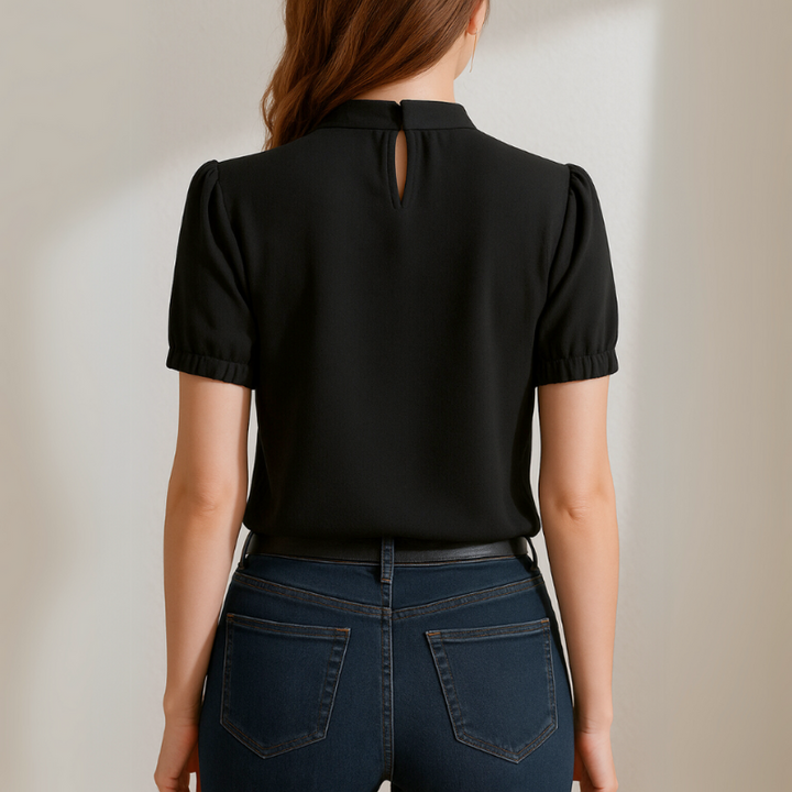 Black Women’s Long Sleeve Keyhole Neckline Pleated Blouse on the model