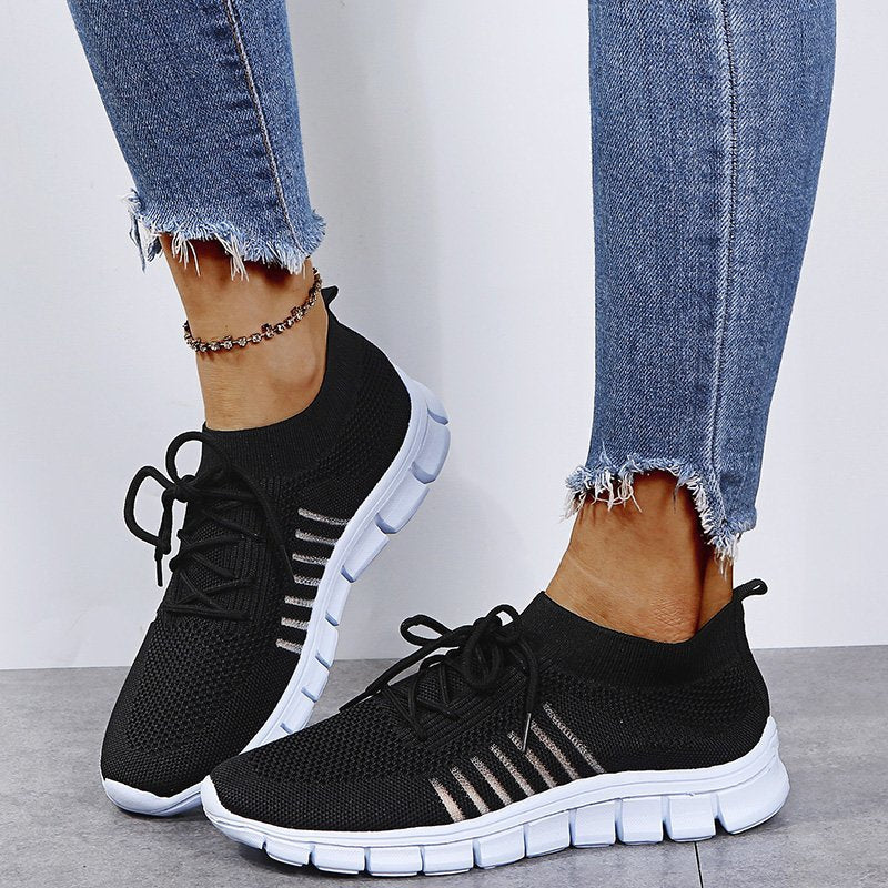 Black Women’s Breathable Mesh Walking Sneakers on the model