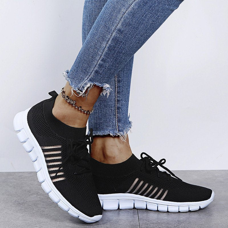 Black Women’s Breathable Mesh Walking Sneakers on the model