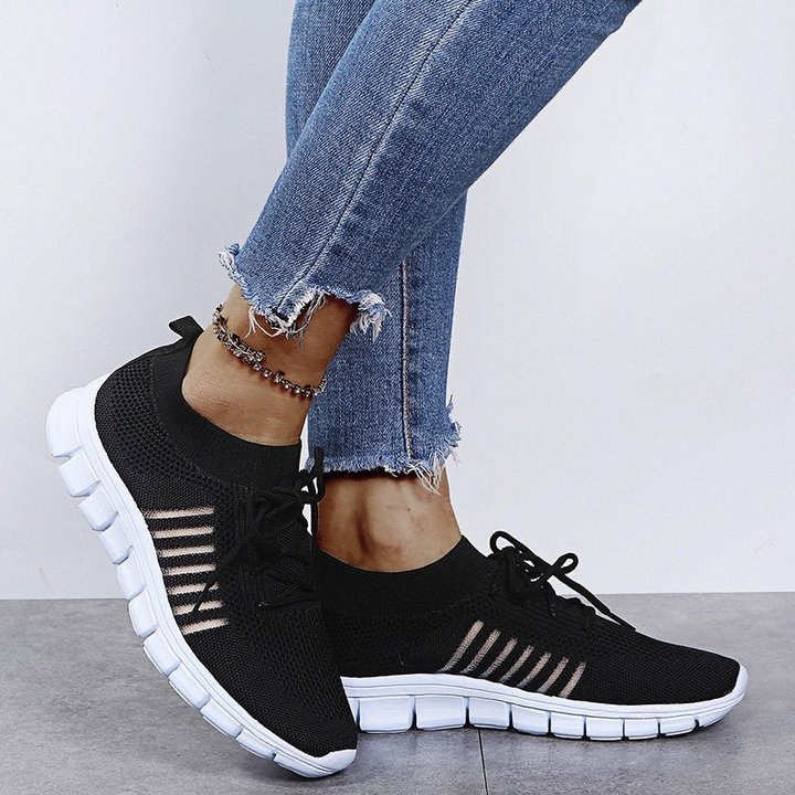 Black Women’s Breathable Mesh Walking Sneakers on the model