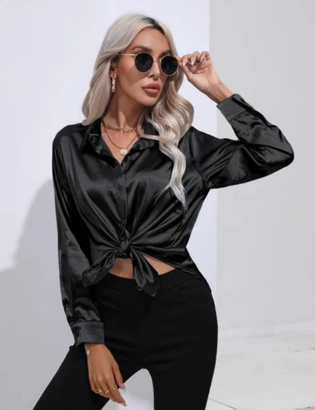 Black Women’s Relaxed Button-Up Blouse on the model