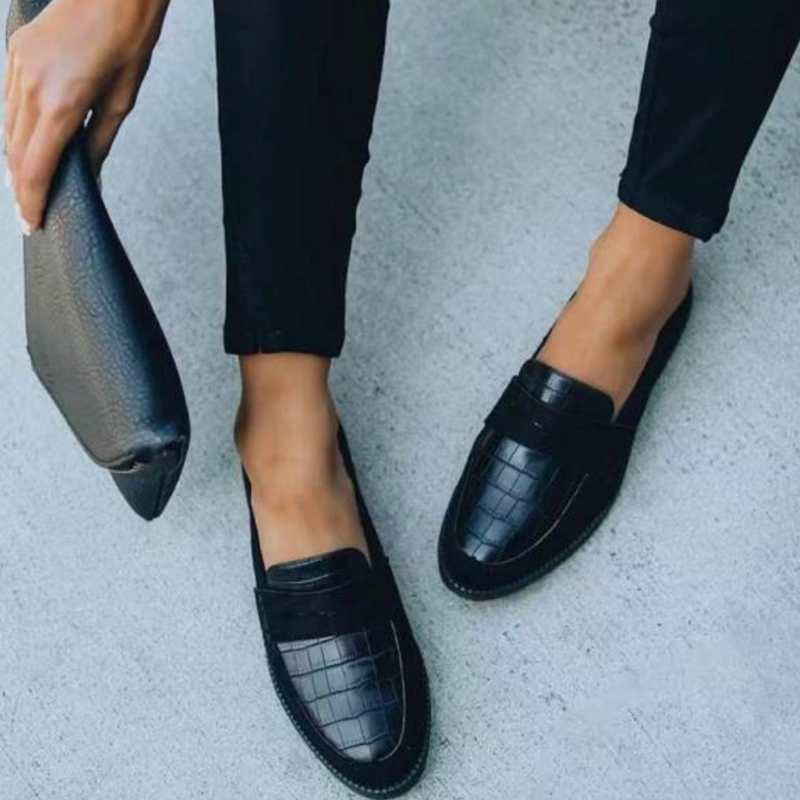 Black Women’s Timeless Luxury Comfort Loafers on the model