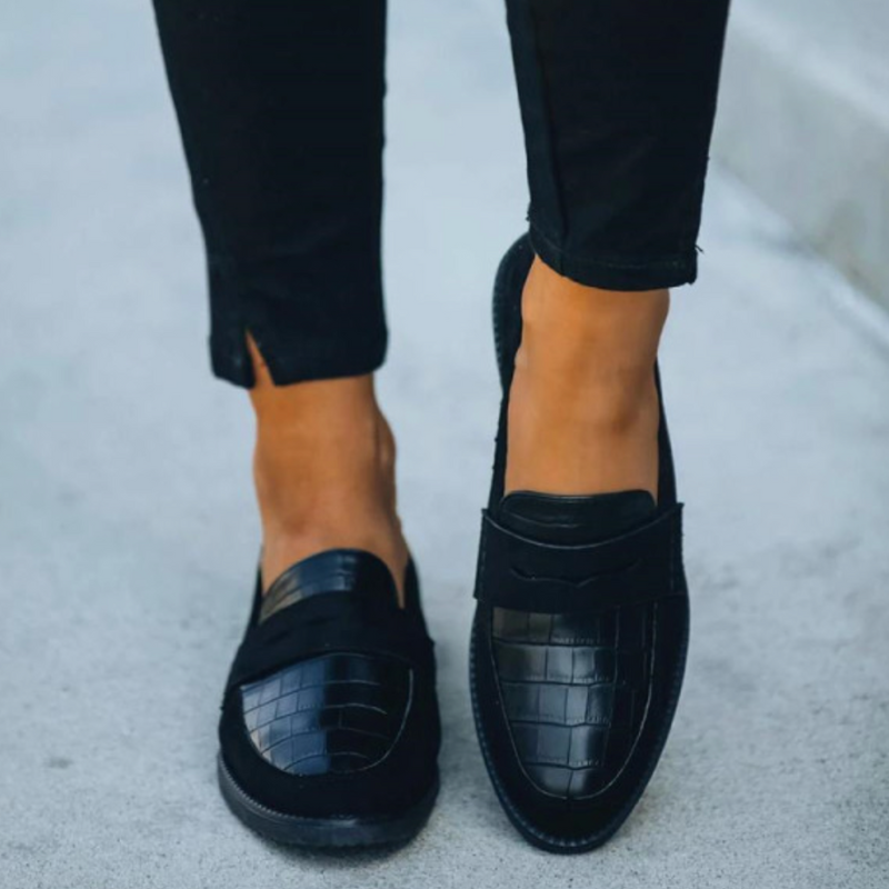 Black Women’s Timeless Luxury Comfort Loafers on the model