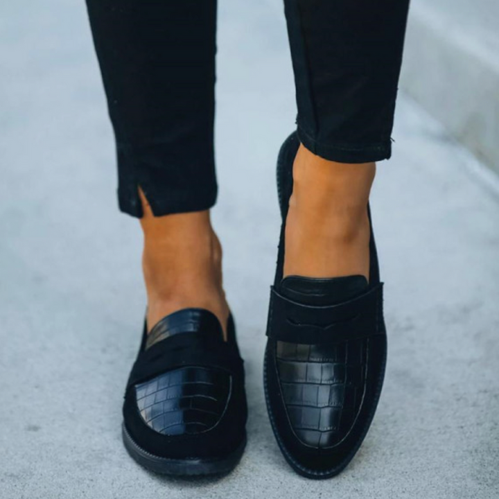 Black Women’s Timeless Luxury Comfort Loafers on the model