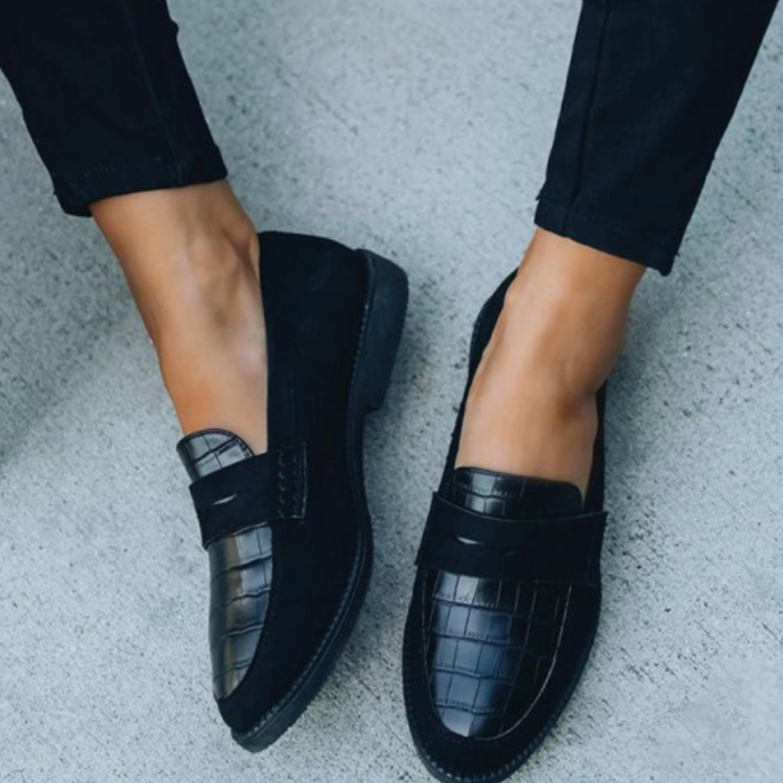 Black Women’s Timeless Luxury Comfort Loafers on the model