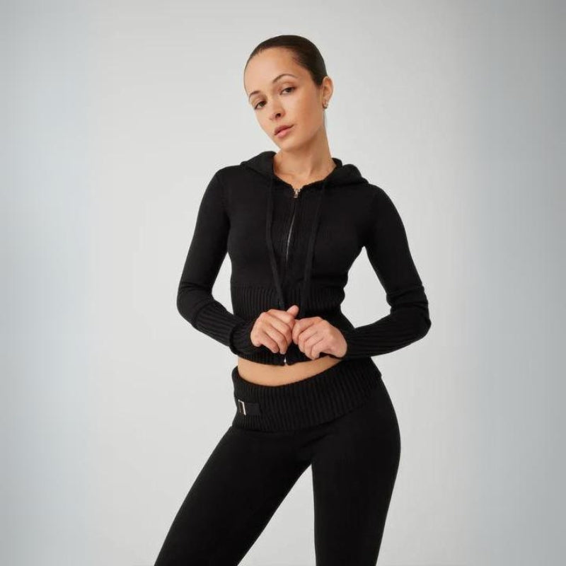 Black Women’s Cozy Fitted Zip-Up Cloud Knit Set on the model
