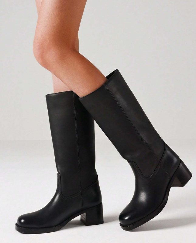 Black Women’s Insulated Comfort Knee-High Boots with Everyday Edge on the model