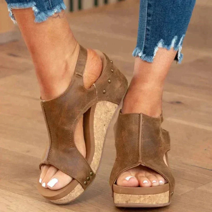 Brown Women’s Comfort Wedge Heel Sandals on the model
