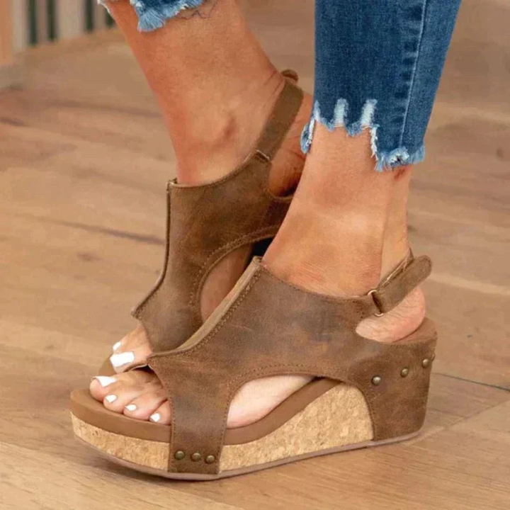Brown Women’s Comfort Wedge Heel Sandals on the model