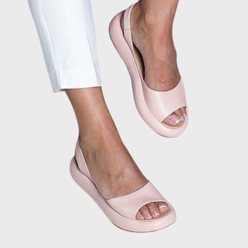 Pink Women’s Casual Footbed Slip-On Sandals on the model