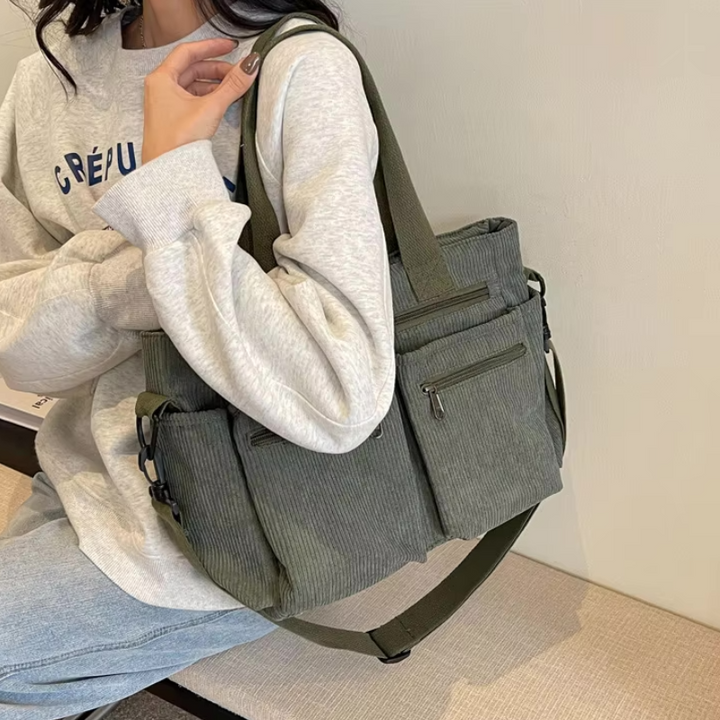 Gray Women’s Everyday Multi-Pocket Bag on the model