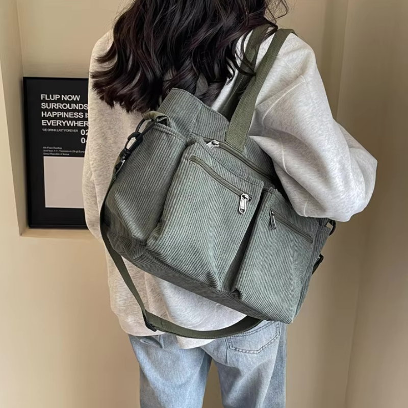 Gray Women’s Everyday Multi-Pocket Bag on the model