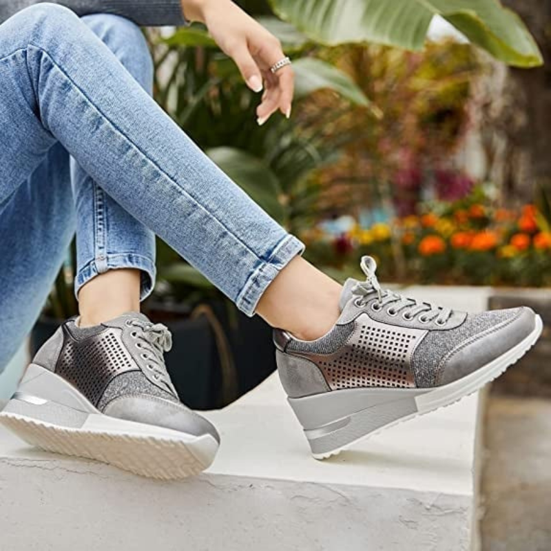 Gray Women’s Hidden High-Heeled Wedge Mesh Fit Trainers on the model