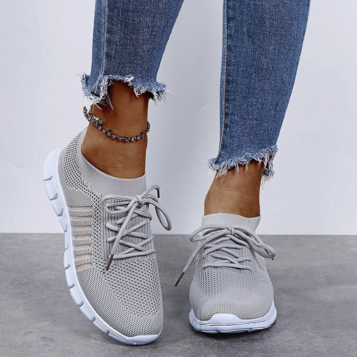Gray Women’s Breathable Mesh Walking Sneakers on the model