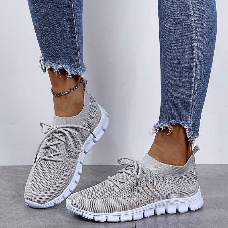 Gray Women’s Breathable Mesh Walking Sneakers on the model