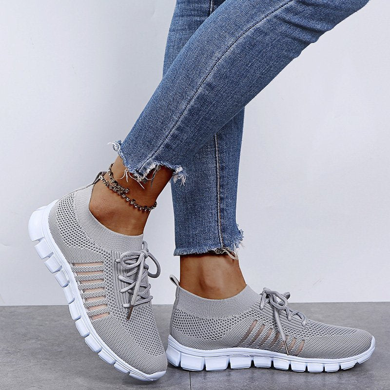 Gray Women’s Breathable Mesh Walking Sneakers on the model