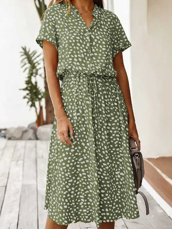 Green Women’s Breezy Printed Midi Summer Dress with Short Sleeves on the model