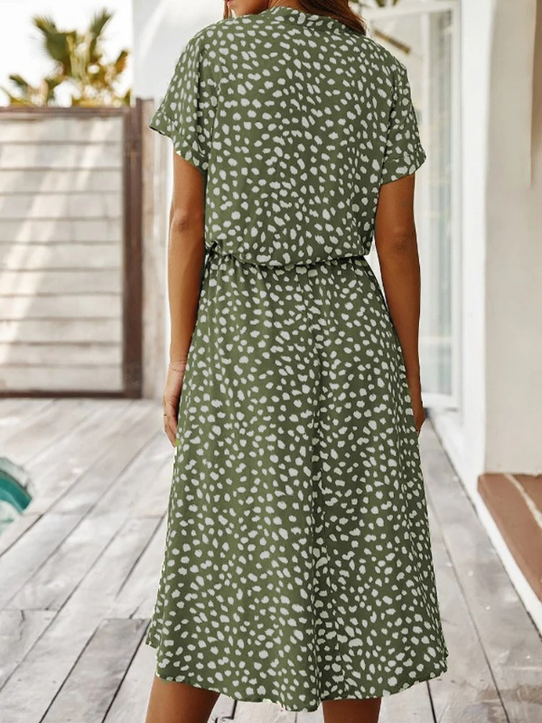 Green Women’s Breezy Printed Midi Summer Dress with Short Sleeves on the model