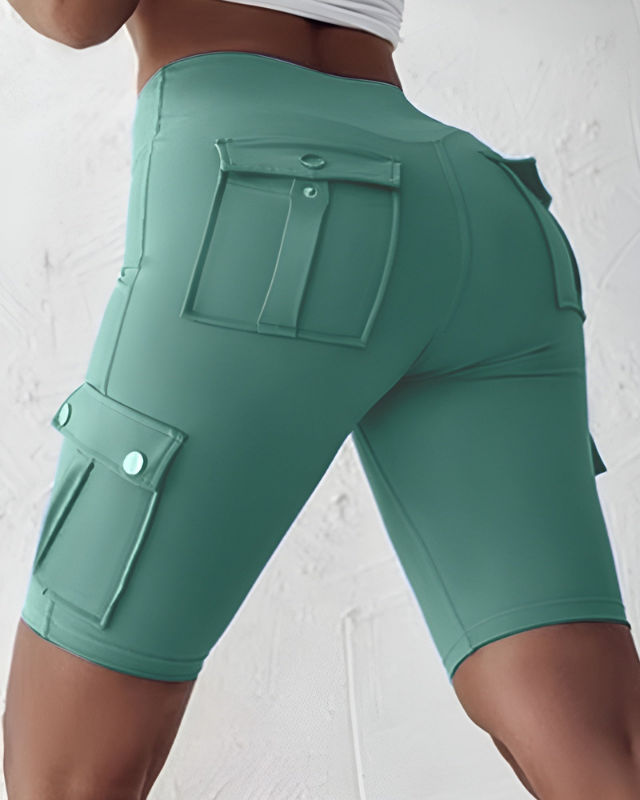 Green Women’s Tie-Belt High-Waisted Rolled Hem Shorts on the model