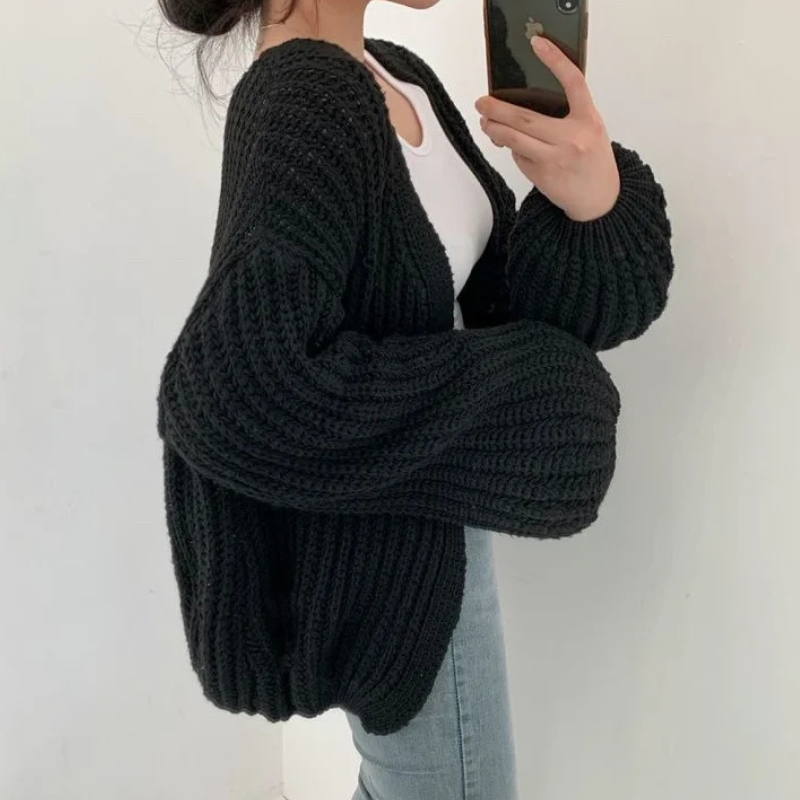 Black Women’s Lantern Sleeve Vintage Cardigan on the model