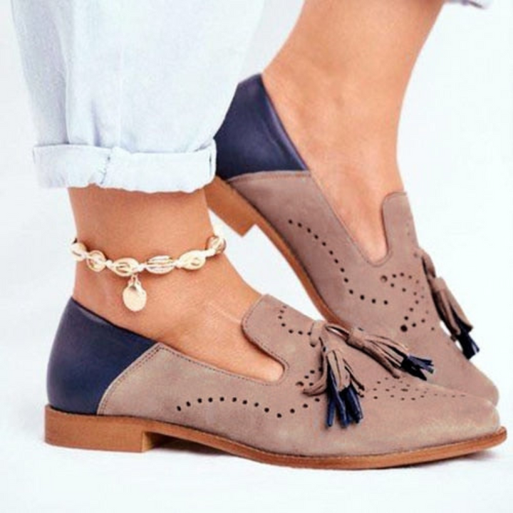 Khaki Women’s Classic Tassel Slip-On Loafers on the model
