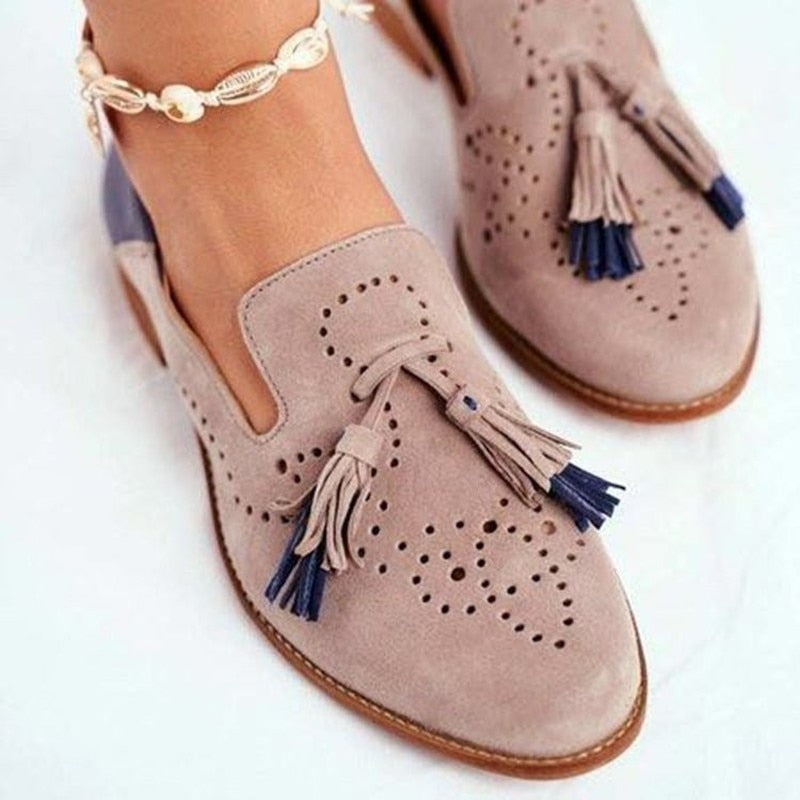 Khaki Women’s Classic Tassel Slip-On Loafers on the model