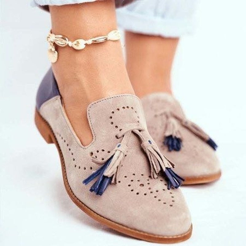 Khaki Women’s Classic Tassel Slip-On Loafers on the model
