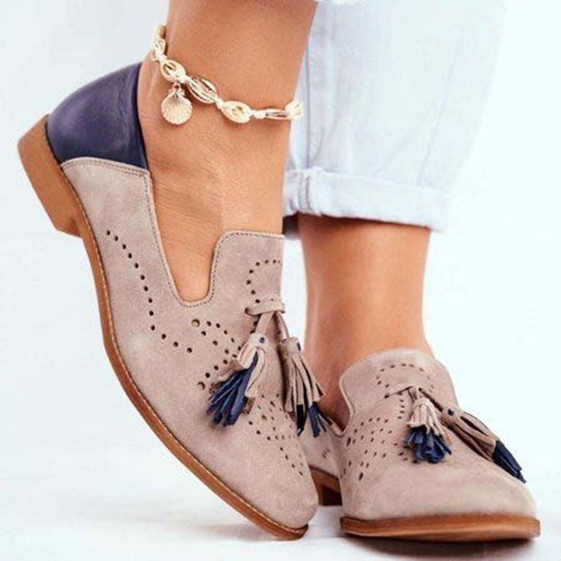 Khaki Women’s Classic Tassel Slip-On Loafers on the model