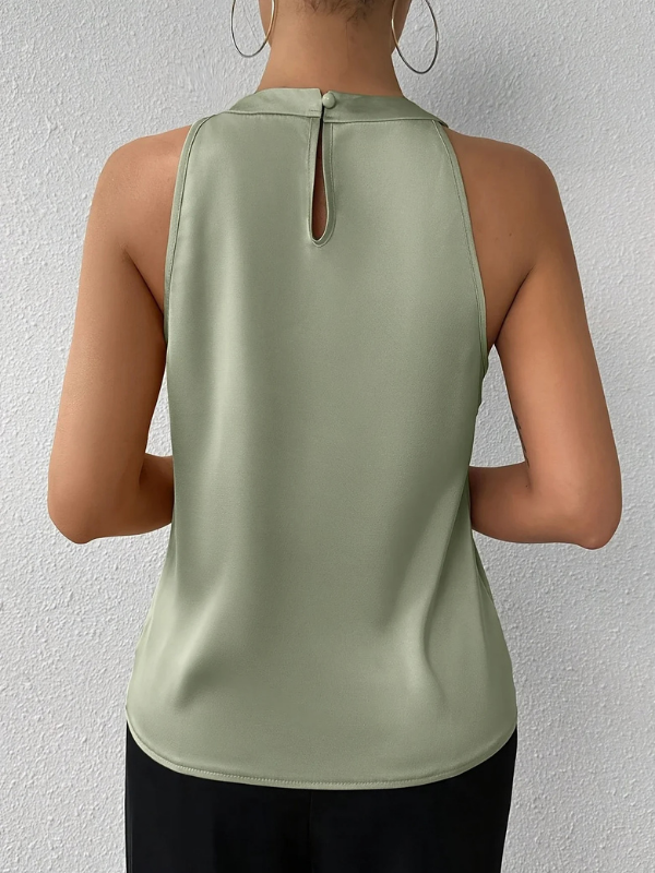 Light Green Women’s Elegant Pleated Halter Neck Blouse on the model